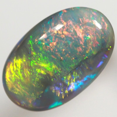 SOLID SEMI BLACK OPAL  Very bright fire, unusual picture pattern. SEE VIDEO